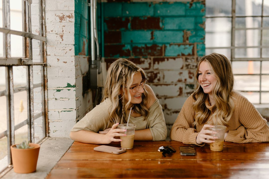 Two people spending time together and talking in a cafe