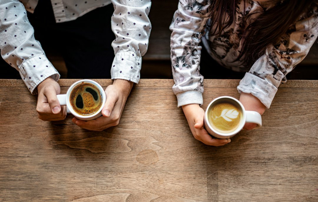 Friends talking together at a cafe